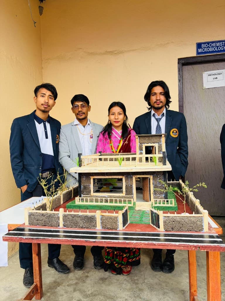 Students presenting an architectural model